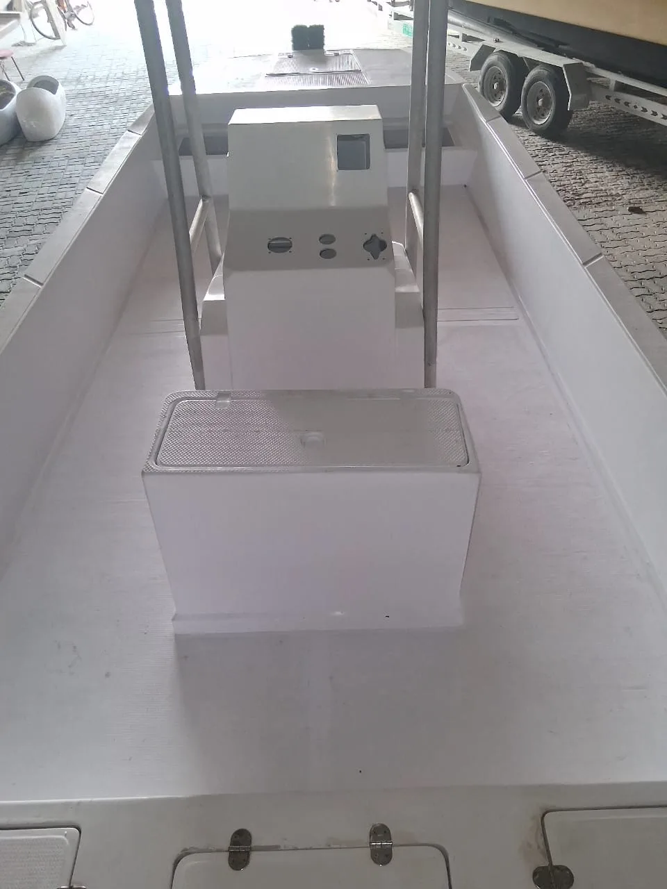 A center console and cool box taking shape on a new deck