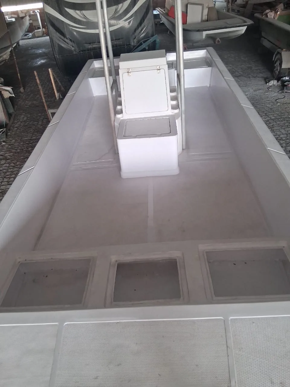 A white hull interior with center console under construction